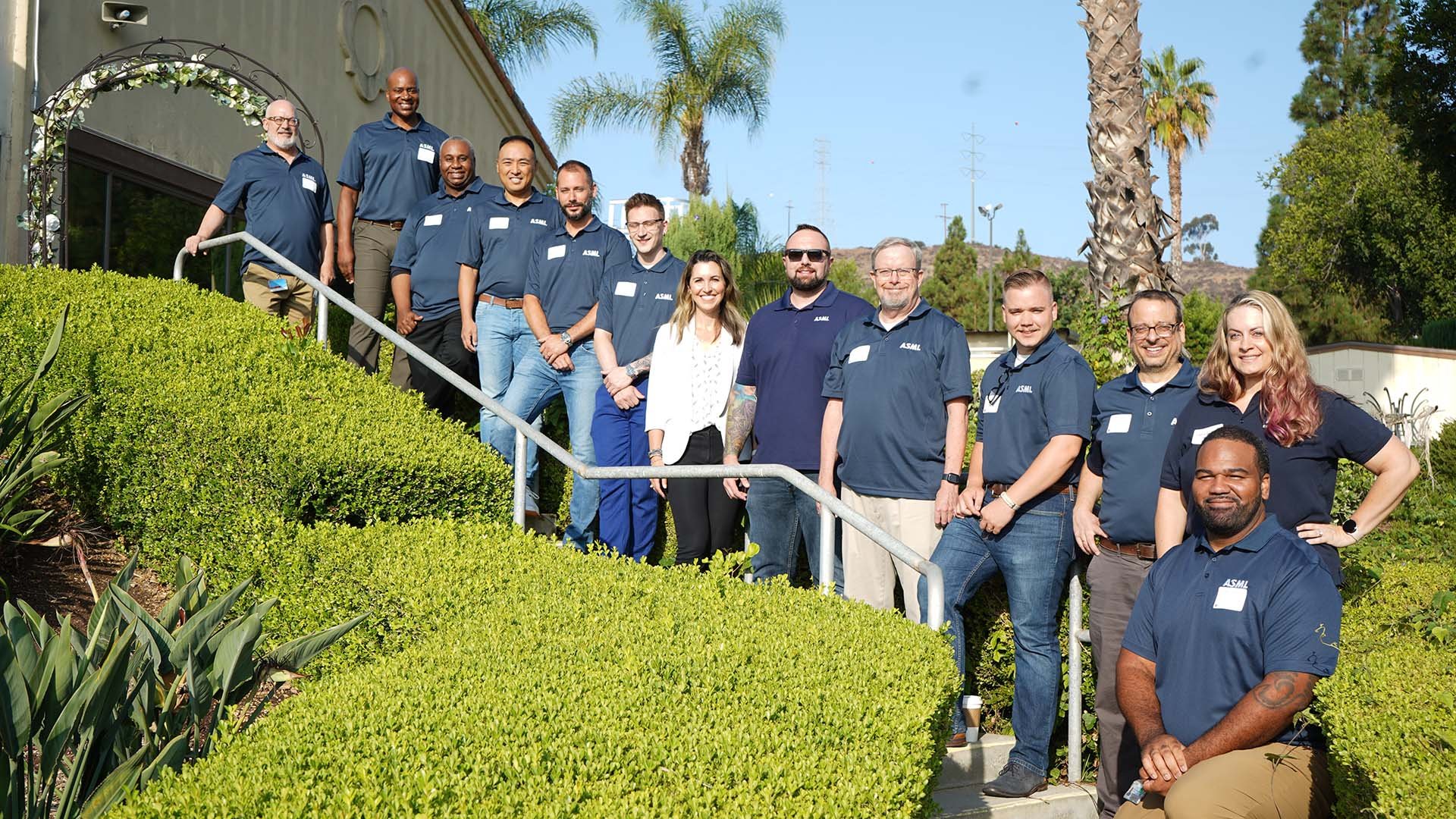 Members of the ASML Veterans employee network stand outside an ASML office in San Diego, California. Members of the ASML Veterans employee network stand outside an ASML office in San Diego, California.